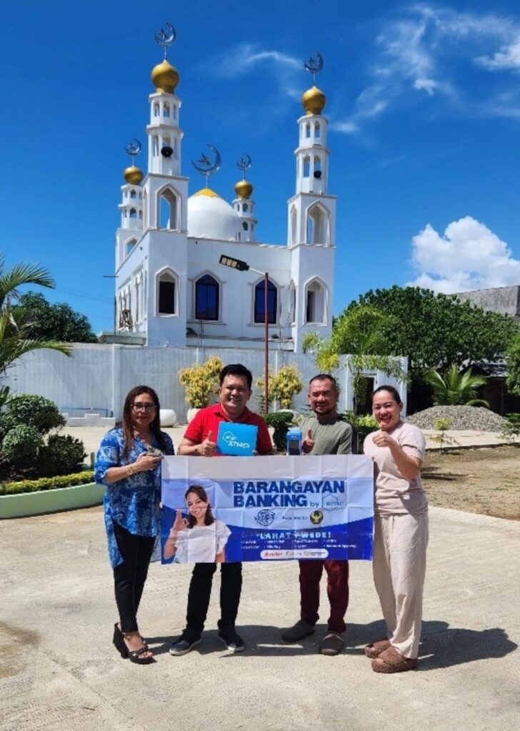 From left to right: Zeny Abillera, Chief Financial Officer of PhilTech Inc.; Arnold Arbillera, Founder and CEO of PhilTech Inc.; Hon. Mohamad Faizal Jamalul, Municipal Mayor of Turtle Island, Tawi-Tawi, accompanied by his wife Mrs. Jay Sayang Jamalul, mark the commencement of RCBC’s Barangayan Banking on Turtle Island. Read more at: https://tribune.net.ph/2023/12/rcbc-pioneers-phygital-banking-access-in-mindanao/ Read more Daily Tribune stories at: https://tribune.net.ph/ Follow us on our social media Facebook: @tribunephl Youtube: TribuneNow Twitter: @tribunephl Instagram: @tribunephl TikTok: @dailytribuneofficial